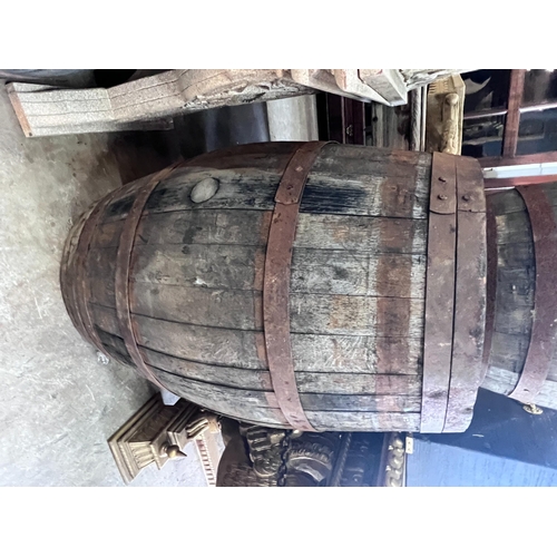 2087 - Three iron bound staved wood barrels, largest height 98cm