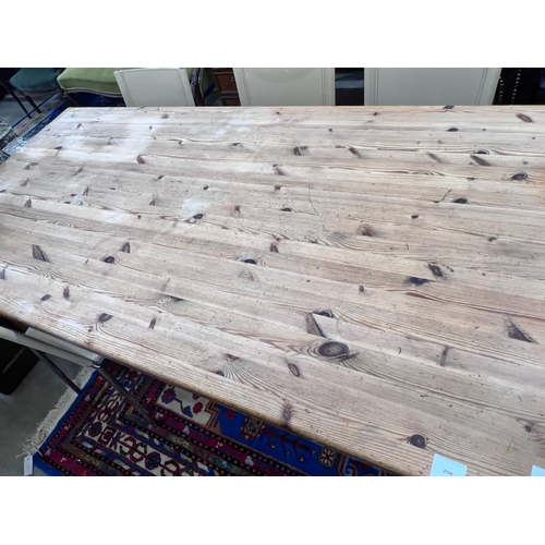 2104 - A Victorian style rectangular pine kitchen table, length 182cm, depth 93cm, height 76cm