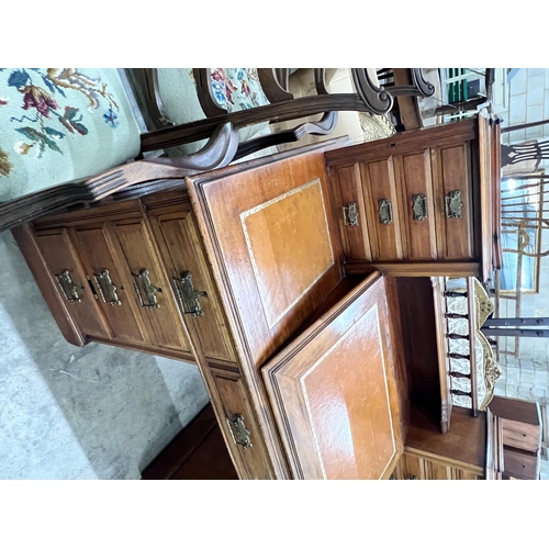 2111 - A late Victorian mahogany pedestal desk with hinged slant front, width 137cm, depth 73cm, height 113... 