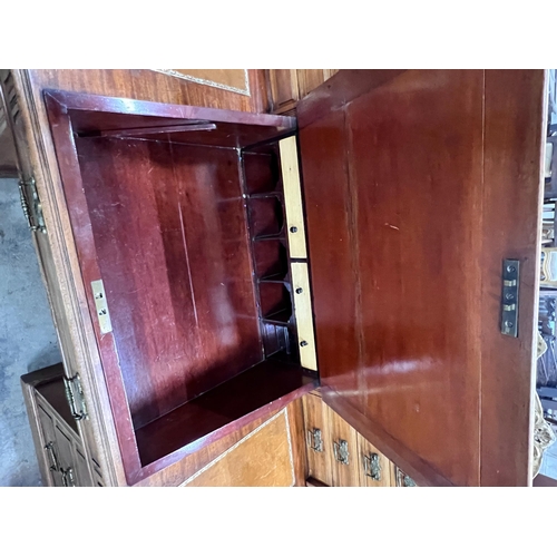 2111 - A late Victorian mahogany pedestal desk with hinged slant front, width 137cm, depth 73cm, height 113... 