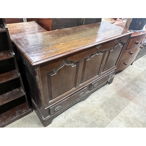 2115 - A mid 18th century oak mule chest with arched triple panelled front, width 144cm, depth 51cm, height... 