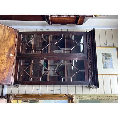 2159 - A George III mahogany bureau bookcase of narrow proportions with panelled cupboard base, width 77cm,... 