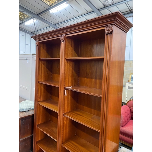 105 - A Victorian style mahogany open bookcase, width 138cm, depth 37cm, height 213cm