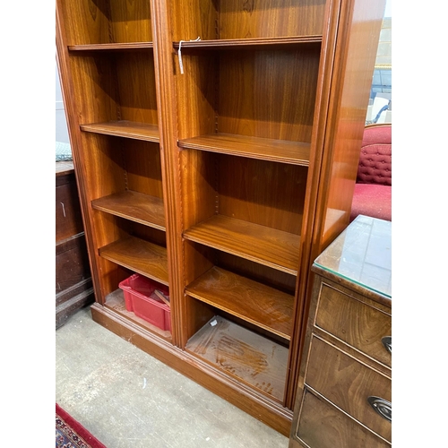 105 - A Victorian style mahogany open bookcase, width 138cm, depth 37cm, height 213cm