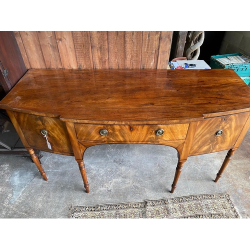 115 - A Regency mahogany bowfront sideboard, length 184cm, depth 75cm, height 93cm