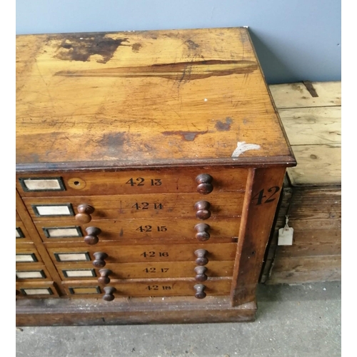 121 - A large Victorian oak geological specimen cabinet, fitted 18 drawers with side locking bars, width 1... 