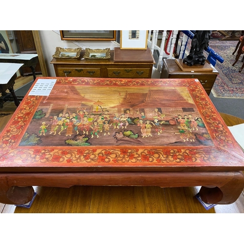 138 - A rectangular painted  Thai coffee table width 119cm, depth 79cm, height 40cm