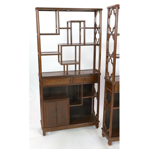 145 - A pair of Chinese jichimu display cabinets, each with asymmetrical open shelves above two drawers, f... 