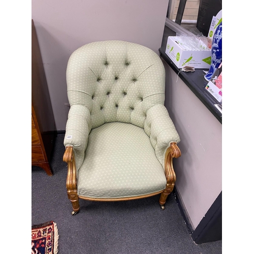 165 - A Victorian carved upholstered elbow chair, width 70cm, depth 90cm, height 92cm