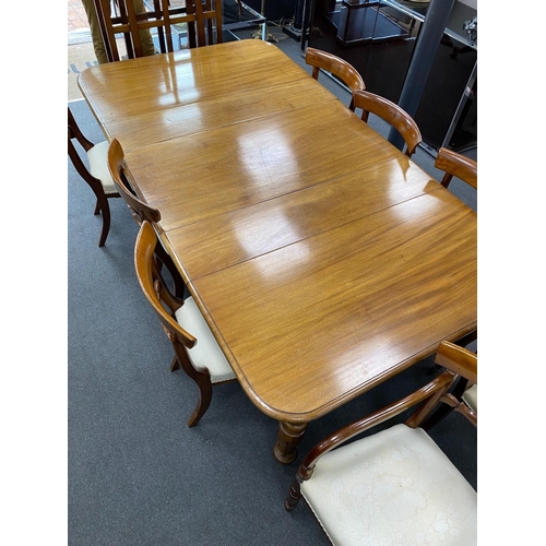 167 - An early Victorian mahogany rectangular extending dining table, length 220cm extended, three spare l... 