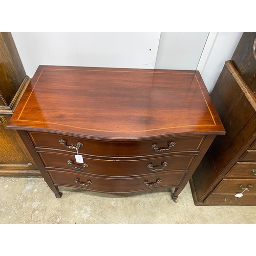 18 - An Edwardian satinwood banded serpentine front inlaid mahogany three drawer chest, width 91cm, depth... 