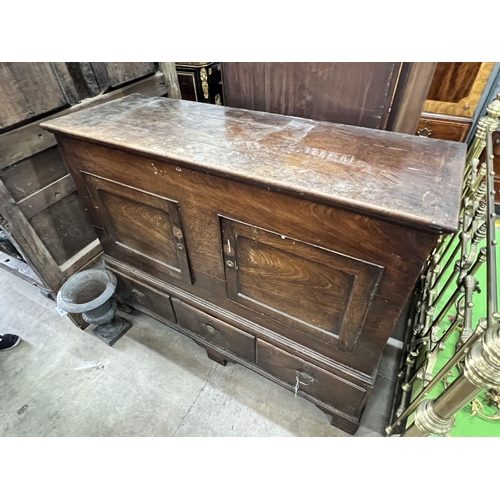 2 - A mid 18th century fruitwood mule chest, adapted, with two panelled doors over three drawers, width ... 