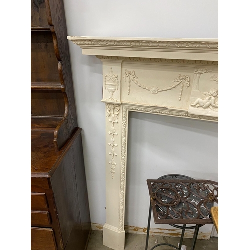 20 - A George III style painted pine and composition fire surround with classical frieze, width 144cm, de... 