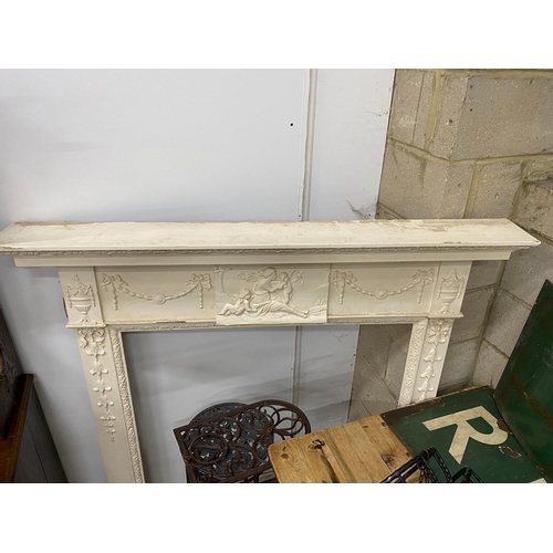 20 - A George III style painted pine and composition fire surround with classical frieze, width 144cm, de... 