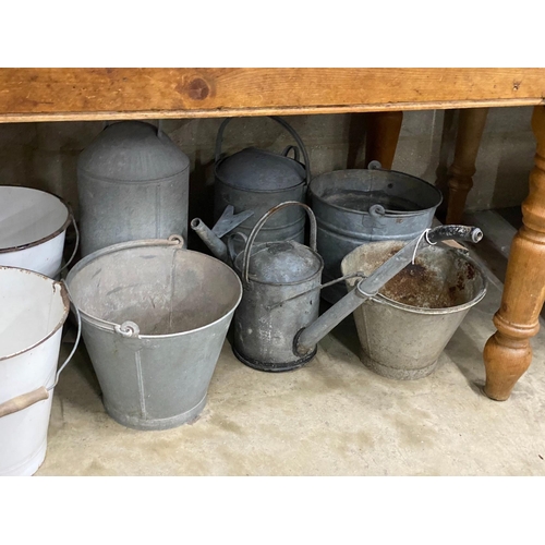 23 - Ten galvanised and enamelled buckets, watering cans and feeder