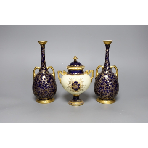 253 - A  pair of Royal Worcester bottle vases and a Coalport landscape vignette vase and cover, pair of va... 