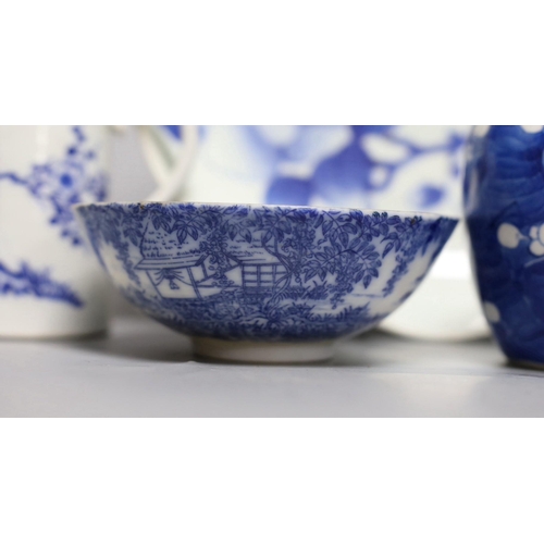 256 - A Japanese Edo period blue and white dish, a Chinese Prunus blossom jar, late 19th century, a provin... 