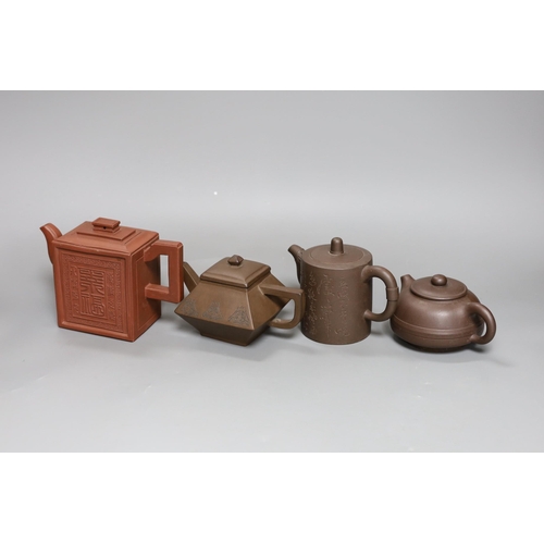 259 - A Chinese Yixing rectangular teapot and three other Yixing teapots (4), Tallest 12 cms high,