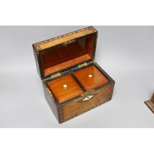 266 - A Victorian walnut and marquetry tea caddy and an inlaid mahogany mantel timepiece,box 20 cms wide 1... 