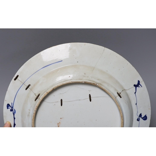 268 - Three Chinese export blue and white dishes, 18th/19th century,largest 42 cms wide,