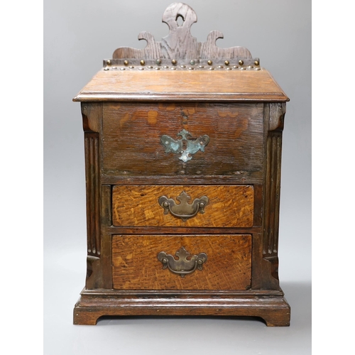 290 - An 18th century and later oak spice cupboard, 53 cms high