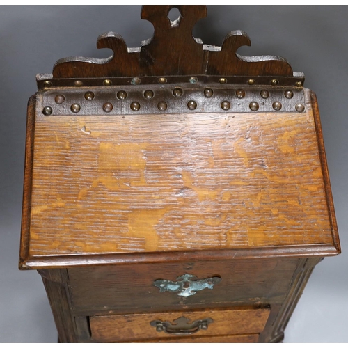 290 - An 18th century and later oak spice cupboard, 53 cms high