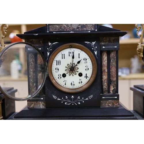 294 - A black slate and marble clock garniture,clock 33cms high,