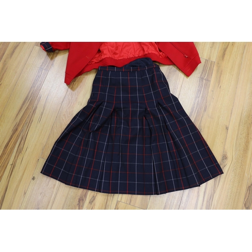 296 - Two vintage Burberry items of clothing: a pleated skirt and a red Harrington jacket,