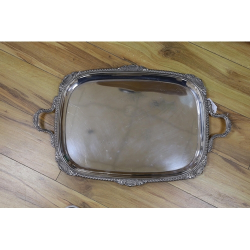 303 - A large silver plated two handled tray and a similar salver,tray 65 cms wide,