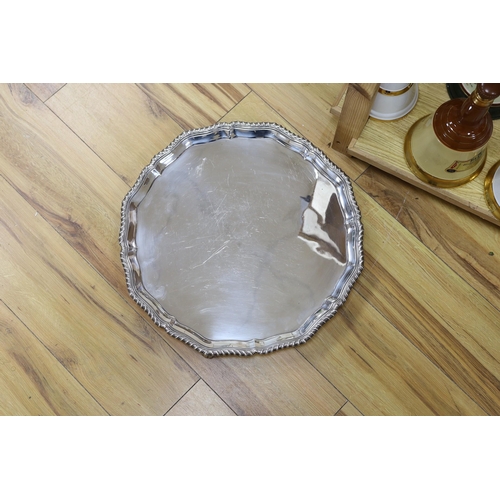 303 - A large silver plated two handled tray and a similar salver,tray 65 cms wide,