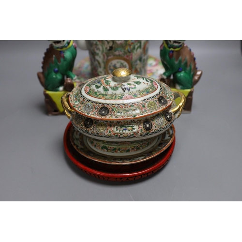 307 - A Cantonese famille rose plate and teapot with cover, a pair of Chinese seated dogs, and a tureen wi... 