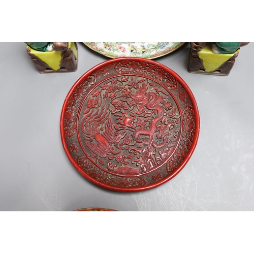 307 - A Cantonese famille rose plate and teapot with cover, a pair of Chinese seated dogs, and a tureen wi... 