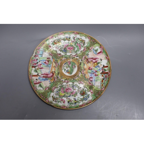 307 - A Cantonese famille rose plate and teapot with cover, a pair of Chinese seated dogs, and a tureen wi... 