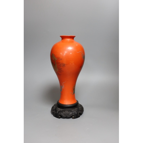 311 - A large Chinese Fuzhou lacquer red 'dragon' vase, dated 1956, 33.5cm tall