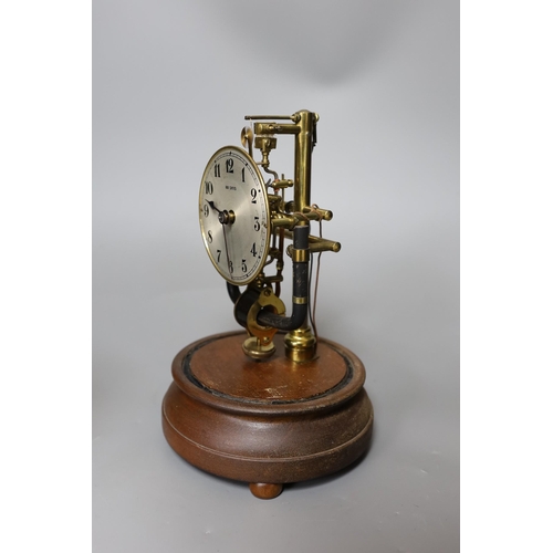 319 - A Bulle electric clock under a glass dome,28 cms high,