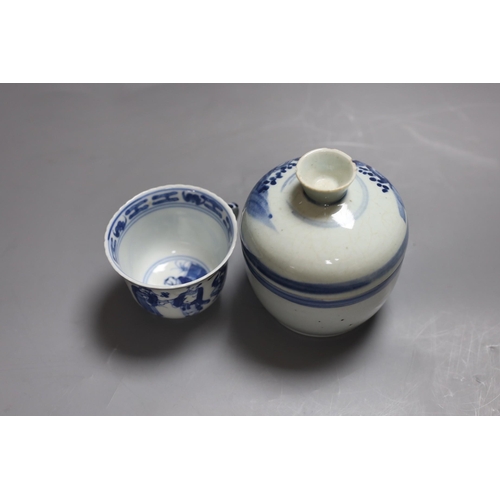 327 - A 19th century blue and white jar with cover and a similar cup,Jar and cover 13 cms high,... 