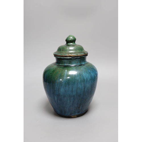 328 - A Chinese mottle glazed terracotta jar and cover, 19th century,24 cms high,