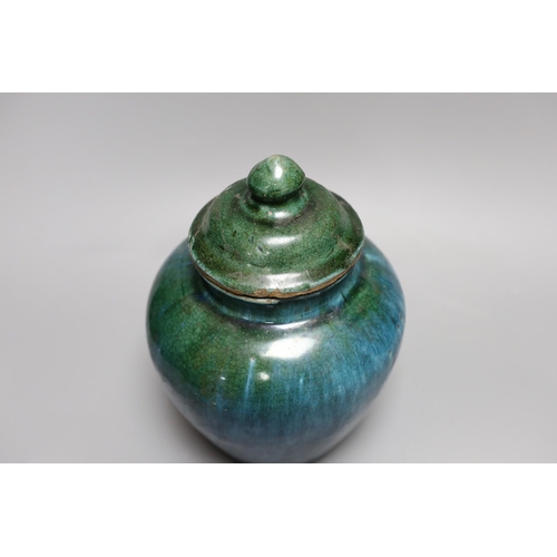 328 - A Chinese mottle glazed terracotta jar and cover, 19th century,24 cms high,