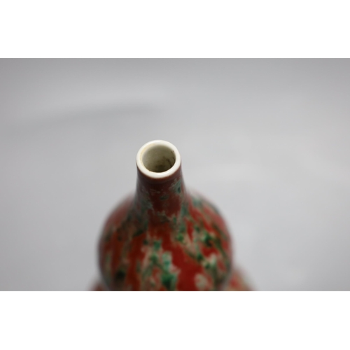 337 - A Chinese flambé double gourd vase,21 cms high,