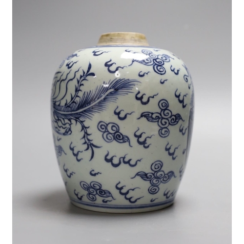 339 - A Chinese blue and white 'phoenix' jar, 17 cms high,