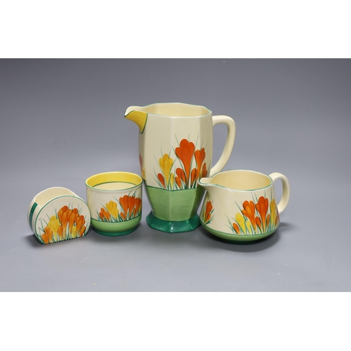 356 - Two Clarice cliff Sungleam, crocus  jugs and two pots, (4)tallest jug 17 cms high,