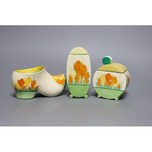 362 - A Clarice Cliff sungleam crocus, jam pot and cover, a sugar shaker and a Dutch clog ornament (3),jam... 