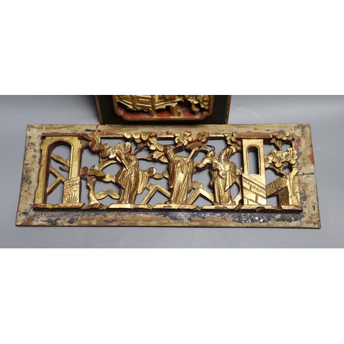 377 - Two Chinese carved giltwood panels,widest 35 cms,