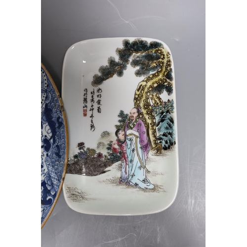 382 - Four 18th / 19th century Chinese plates, and a later dishlargest plate 29 cms diameter,