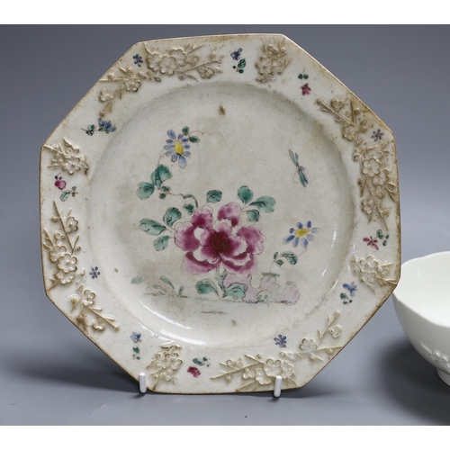 401 - An 18th century Bow white glazed prunus bowl, and a Bow octagonal plate, with floral design, 21cm ... 