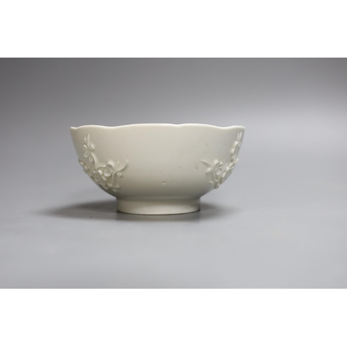 401 - An 18th century Bow white glazed prunus bowl, and a Bow octagonal plate, with floral design, 21cm ... 