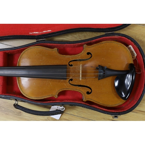 407 - A cased student's violin, length of back 33 cm