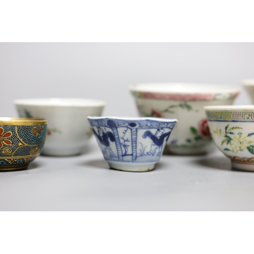 425 - A Chinese Dehua libation cup, eight 18th century and later Chinese porcelain tea bowls and a Kutani ... 