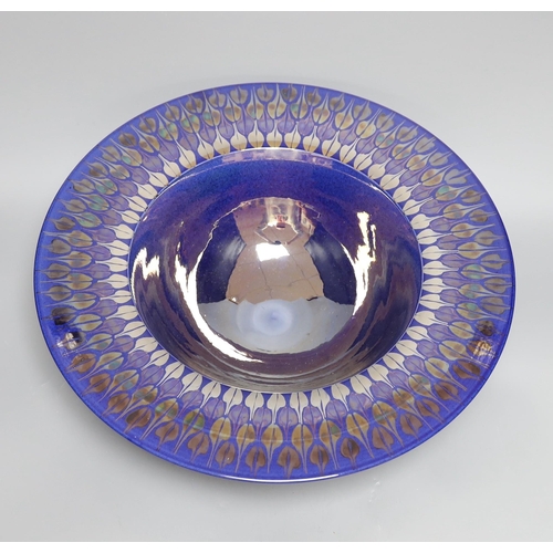 426 - A Tobias Harrison Cumbrian studio pottery blue lustre glazed centre piece bowl, 43 cms diameter,... 