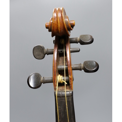 431 - An early 20th century cased violin, length of back 36 cm